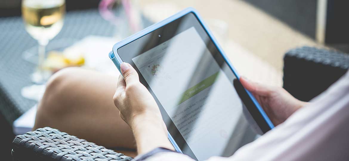 Person Holding Tablet Person Holding Tablet
